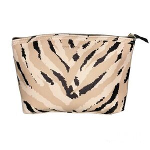 Ruby Cash animal print top zipper makeup bag. Black, tan and cream.